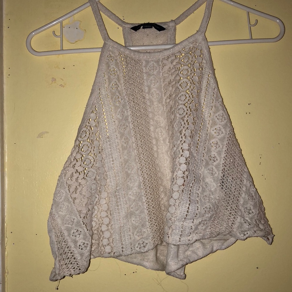 off white halter type top, completely see through.